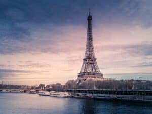 Eiffel Tower rising above the rooftops of Paris